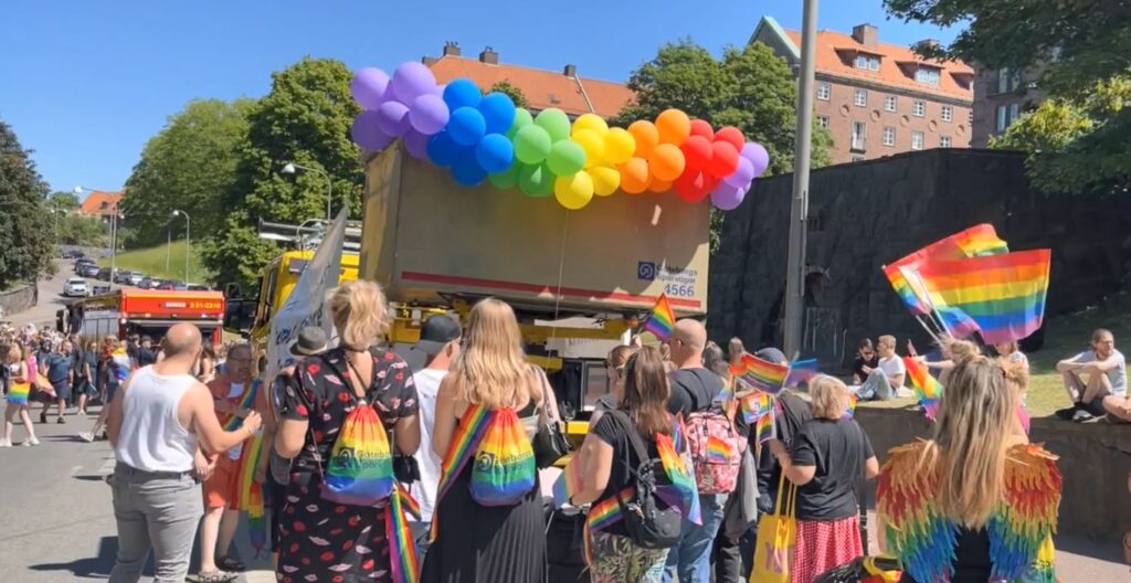 Prideparad bild med regnbågsfärgade ballonger